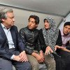 High Commissioner António Guterres (left) meets a Syrian refugee family during his visit to Turkey's Nizip Camp.