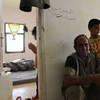 A boy and his father in Cyber City, a transit facility for Syrian refugees, in Ramtha, Jordan.
