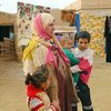 Une famille déplacée établie dans la zone du gouvernorat d'Al-Hassakeh, dans le nord de la Syrie, où le PAM fournit une assistance alimentaire.