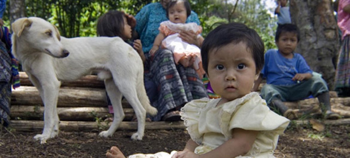 A family near the Chin Tiul Community School in San Pedro Carchá, Guatemala.