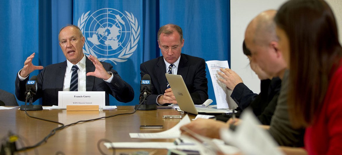 WIPO Director General Francis Gurry (left) briefs journalists on tech disputes survey and 2012 domain name cases.
