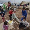 Des enfants syriens déplacés jouent dans le camp de Domiz, situé dans le Kurdistan iraquien.