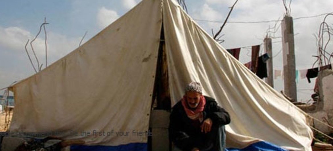 An old man sits outside his UNRWA-supplied tent in the Ezbet Abed Rabbo area of northern Gaza.