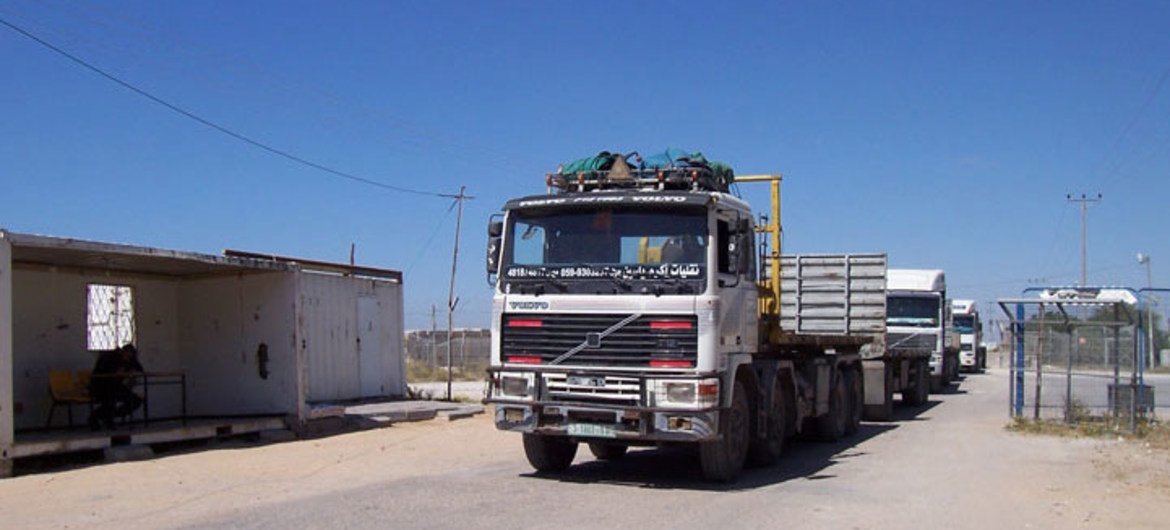 Gaza authorities registering trucks entering Rafah after retrieving imports from Kerem Shalom.
