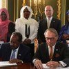Deputy Secretary-General Jan Eliasson (right) and Somali President Hassan Sheikh Mohamud sign a joint communiqué on preventing sexual violence.