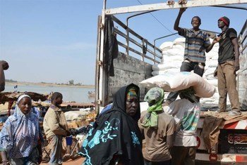 Sacks of rice being transported in Mali by WFP from the central river port of Mopti to the northern town of Timbuktu and beyond.
