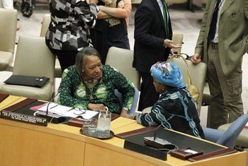 Special Representative for the Central African Republic Margaret Vogt (left) confers with Special Representative on Sexual Violence in Conflict Zainab Bangura at the Security Council.