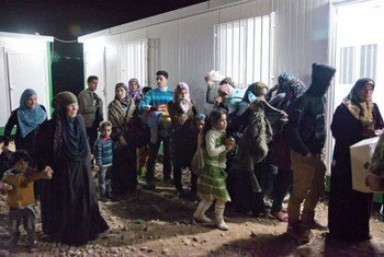 Syrian families continue to flee across borders. This photograph was taken at the Jordanian border.