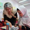 UNESCO Director-General, Irina Bokova (left), toured the Ayesha-e-Durrani school in Kabul as part of her three day visit to Afghanistan.
