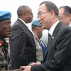 Secretary-General Ban Ki-moon (right) is greeted on arrival in Goma by the Commander of the UN intervention brigade in the Democratic Republic of the Congo (DRC) General James Mwakibolwa.