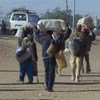 Des ressortissants nigériens qui avaient fui le conflit en Libye, arrivent dans la ville d'Agadez. (archive)
