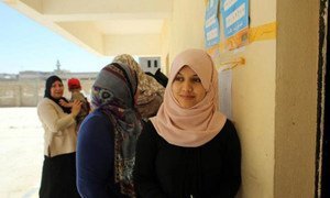 Libyan women queue up to vote on election day in July 2012.