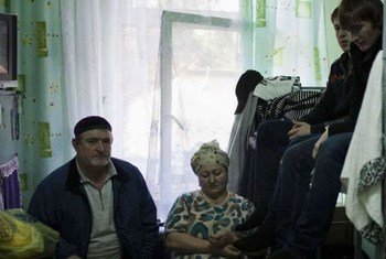 A homeless family from Chechnya at a reception centre in Linin, Poland.