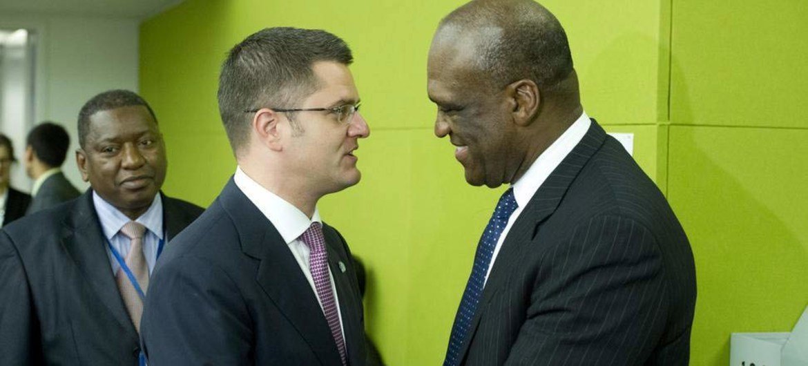 Newly-elected President of the General Assembly Amb. John Ashe of Antigua and Barbuda (right) is congratulated by current President Vuk Jeremic.