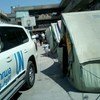 Un véhicule de l'UNRWA dans un camp de réfugiés palestiniens en Syrie.