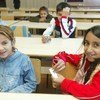 塞尔维亚的罗姆人儿童在教室中上课。欧安组织/Milan Obradovic