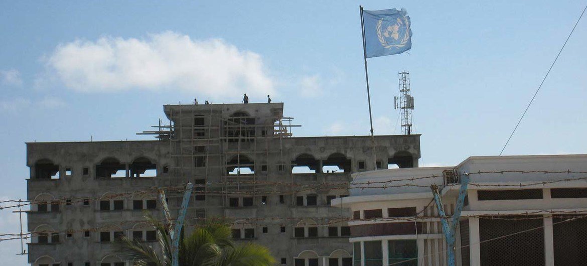 The United Nations flag above part of the UN Common Compound, used by UN humanitarian agencies and their partners, in Mogadishu, Somalia in December 2011.
