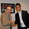 UNRWA Spokesperson Sami M’shasha (left) congratulates the winner of Arab Idol, Mohammad Assaf, on his appointment as UNRWA’s first ever Regional Youth Ambassador for Palestine Refugees.