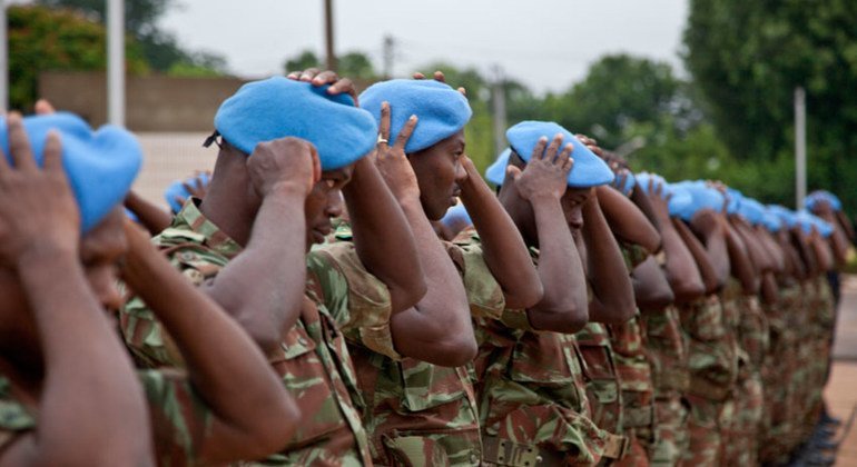 Forces of the UN Peacekeeping mission in Mali receive their blue berets in Bamako.