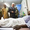 Hervé Ladsous, Under-Secretary-General for Peacekeeping Operations, pays a visit to an injured UNAMID peacekeeper hospitalized in Nyala, Darfur.