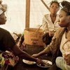 In eastern Democratic Republic of the Congo, these displaced women eat together in the tent they share. UNHCR is concerned about growing violence against women.