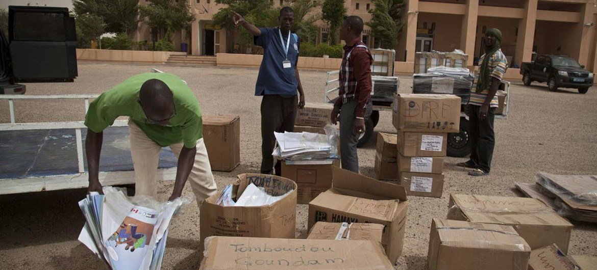 Material for the 11 August 2013 presidential election run off arrives at the Timbuktu airport in Mali.