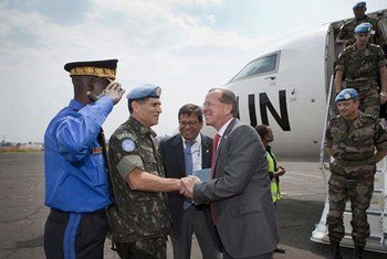 Head of MONUSCO, Martin Kobler (in red tie), is met by the Force Commander in Goma, DRC.