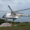 A WFP helicopter departs after airlifting 2 metric tons of food assistance from Bor, the capital of Jonglei state, to Dorein, South Sudan.