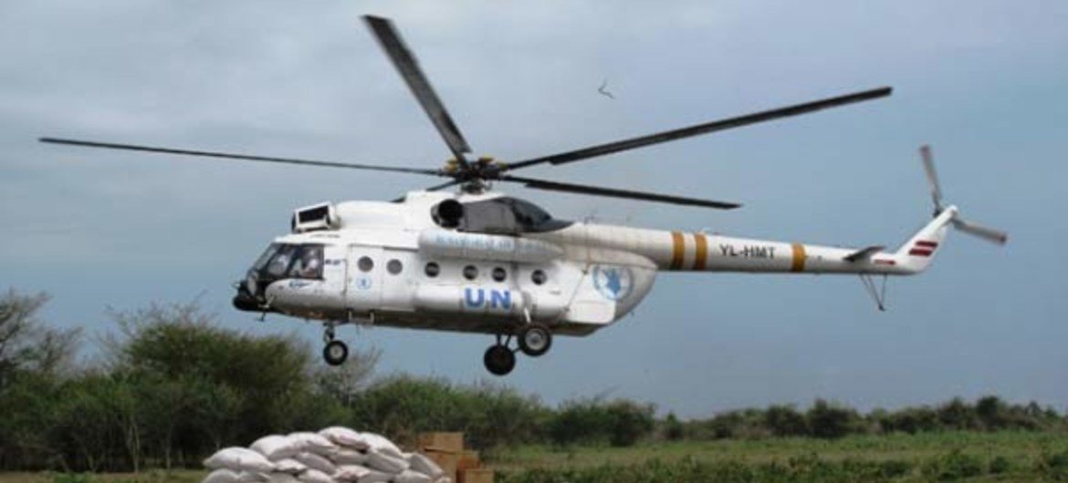 A WFP helicopter departs after airlifting 2 metric tons of food assistance from Bor, the capital of Jonglei state, to Dorein, South Sudan.