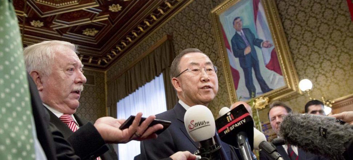 Secretary-General Ban Ki-moon (centre) speaks to journalists in Vienna, Austria.