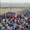 من الأرشيف الآلاف من السوريين يتدفقون عبر الحدود إلى العراق بحثا عن المأوى. الصورة: المفوضية السامية للأمم المتحدة لشؤون اللاجئين /جي. غوبايفا