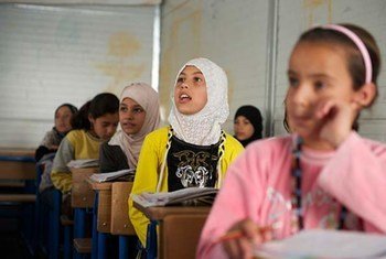 Girls attend class in Za’atari, the world’s second-largest refugee camp.