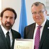 UNODC Executive Director Yury Fedotov (right) with Goodwill Ambassador for Global Justice Nicolas Cage.