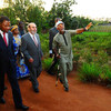 FAO Director-General José Graziano da Silva (centre) accompanied by President Yayi Boni (left) on a visit to Benin.