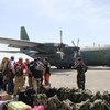 C-130 cargo plane lands in badly affected Tacloban City in the Philippines, in the wake of Typhoon Haiyan.