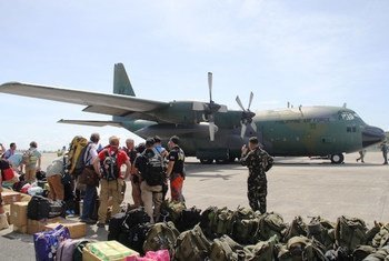 C-130 cargo plane lands in badly affected Tacloban City in the Philippines, in the wake of Typhoon Haiyan.