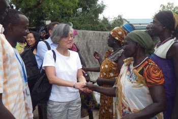 Deputy Humanitarian Chief Kyung-Wha Kang (second left) with residents in Jonglei's Pibor County, South Sudan.