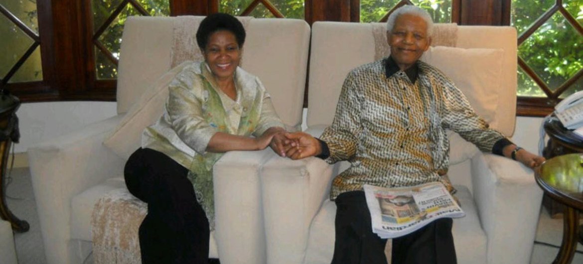 UN Women Executive Director, Phumzile Mlambo-Ngcuka sitting with Nelson Mandela.