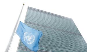 The United Nations in mourning, flies flag at half-mast.