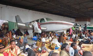 Displaced families in the Central African Republic (CAR) seek shelter at the Bangui airport fearing further attacks.