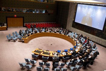A wide view of the Security Council as it hears a briefing by Special Representative for Somalia, Nicholas Kay (on screen), via videolink.