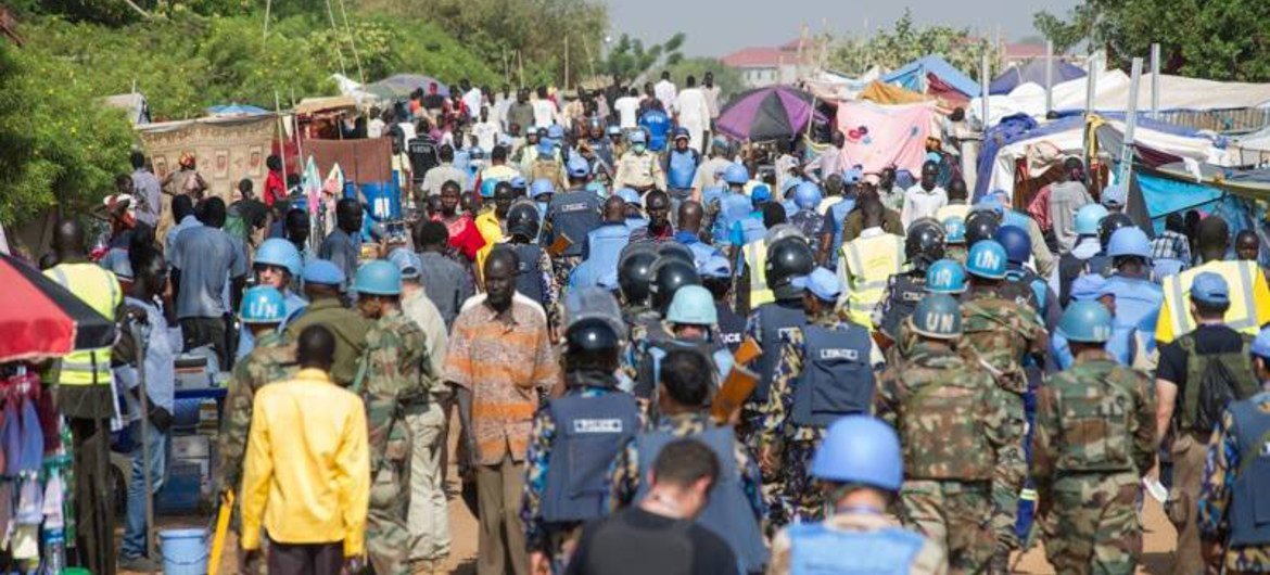 UNMISS personnel conducting a security sweep in its Juba camp to rid it of weapons and smuggled goods, including military and police uniforms.