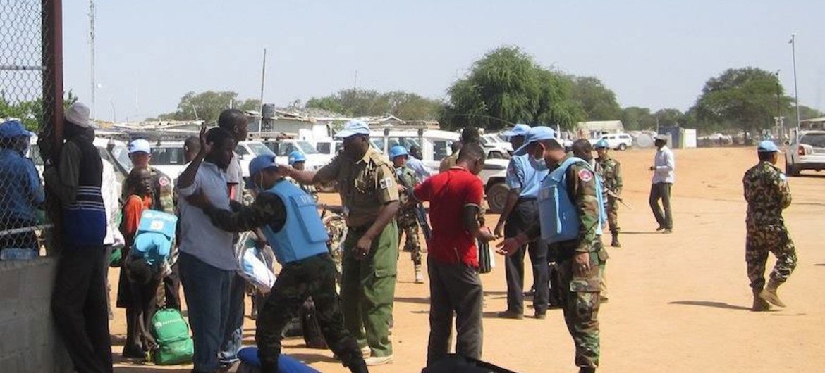 UN Military Police checking for weapons from people seeking shelter in the UNMISS compound in Bor, Jonglei state, South Sudan.