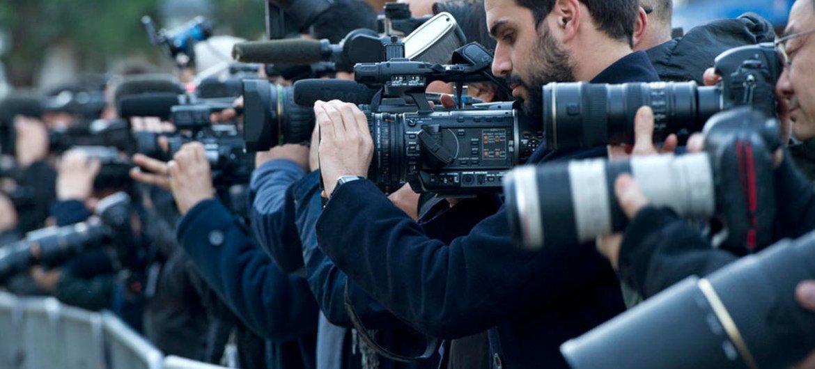 Journalists wait for the arrival of official delegations at the Geneva II Conference on Syria, in Montreux, Switzerland.