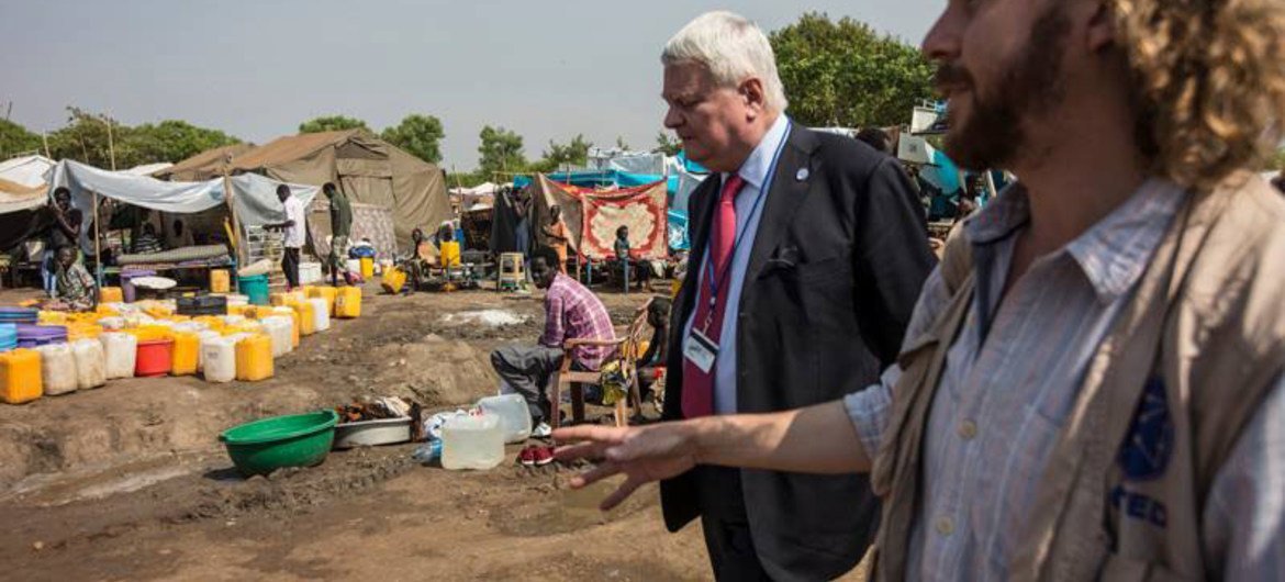 Under-Secretary-General for Peacekeeping Operations Hervé Ladsous (second right) on a visit to the protection of civilians area at the UNMISS base in Tomping, South Sudan.