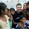 UNICEF Goodwill Ambassador David Beckham visits with children in Tacloban, Philippines.