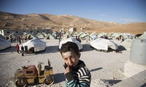 A Syrian boy photographed at a refugee transit site in Arsal, Lebanon. UNHCR is urging countries to offer increased resettlement or other forms of admission, including scholarships, to Syrian refugees.