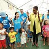 Humanitarian Chief Valerie Amos (centre) visits a Child Friendly Space in Guiuan, Philippines, on 26 February 2014.