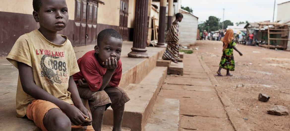 Ten-year-old Prophète (left) and his friend Ardi, 7, live on the streets in PK5, one of the last neighborhoods in Bangui, Central African Republic, where Christians and Muslims still live side by side.