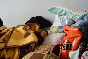 This infant was caught having a nap in Al Qaim in western Anbar, Iraq. He fled there with his mother and siblings to escape the violence in Anbar, which is entering a third month.